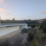 Alcino Soutinho's design of the Soutinho 4 Grandes Villas at the Bom Sucesso Resort in Obidos, featuring a modern steppe landscape integration with clean lines and minimalist structures.