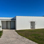 Álvaro Siza Vieira's Siza 14 Villas no Bom Sucesso showcasing a modern design with concrete structures, composite materials, and integrated landscaping, emphasizing daylighting and shadow play at the Bom Sucesso Resort in Obidos.