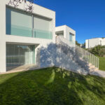 David Chipperfield's Chipperfield 4 Villas no Bom Sucesso showcasing modern design with a focus on daylighting, surrounded by landscaped gardens and estate features at the Bom Sucesso Resort in Obidos.